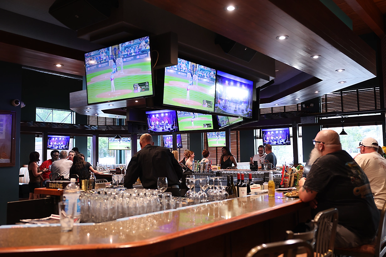 rising phoenix restaurant photo of the bar with tv screens